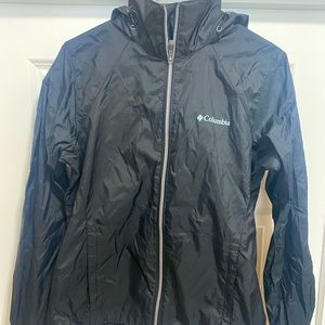 Columbia women’s rain coat with hood.